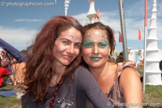 Two woman relax in the ID Spiral Arena at Sunrise Celebration 2007. Yeovil, United Kingdom. © 2007 Photographicon