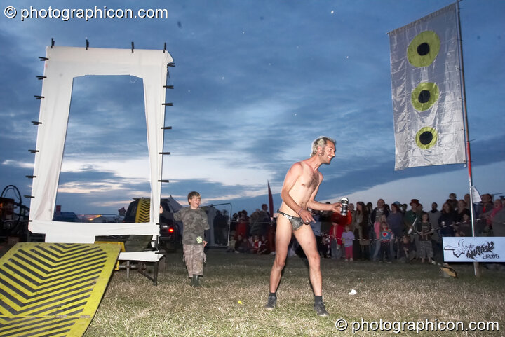A man performs a fire show at Sunrise Celebration 2007. Yeovil, United Kingdom. © 2007 Photographicon