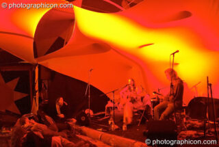 Martha Tilston and friends playing on the Small World Stage at the Turaya Gathering 2004. Wimborne, United Kingdom. © 2004 Photographicon