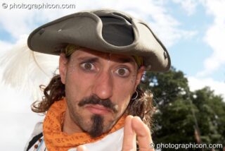 A man in a dandy outfit at Waveform Project 2007. Kenton, Exeter, United Kingdom. © 2007 Photographicon