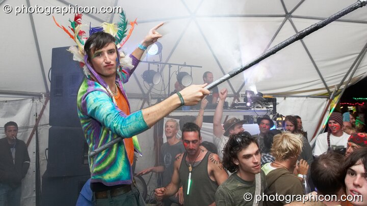 A man with a skull staff dances in the Gaia Chill dome at Waveform Project 2007. Kenton, Exeter, United Kingdom. © 2007 Photographicon