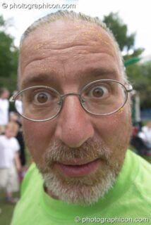 Professor Des Kay, co-founder of Kingston Green Fair, has his perspective squeezed in 2004. Kingston Upon Thames, United Kingdom. © 2004 Photographicon