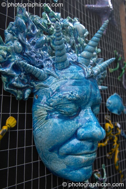 A clay moulding of a human face at Kingston Green Fair 2004. Kingston Upon Thames, United Kingdom. © 2004 Photographicon