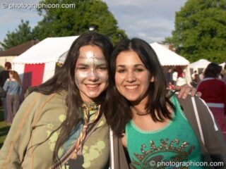 Twin sisters enjoying the day at Kingston Green Fair 2005. Kingston Upon Thames, United Kingdom. © 2005 Photographicon