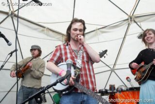 Green Rock River Band perform on the Birthday Cake Bandstand Stage at Kingston Green Fair 2007. Kingston upon Thames, United Kingdom. © 2007 Photographicon
