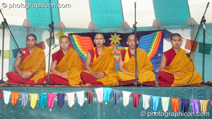 Tibetan monks of Tashi-Lhumpo perform a chant in the Sacred Dance tent at Kingston Green Fair 2007. Kingston upon Thames, United Kingdom. © 2007 Photographicon