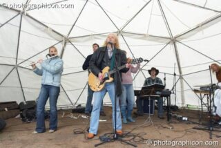 Green Rock River Band perform on the Birthday Cake Bandstand Stage at Kingston Green Fair 2007. Kingston upon Thames, United Kingdom. © 2007 Photographicon