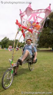 Professor Des Kay on his decorate recumbent bike at the London Green Lifestyle Show 2005. London, United Kingdom. © 2005 Photographicon