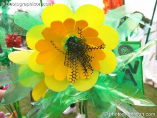 A flower made from reclaimed scrap plastic at the London Green Lifestyle Show 2005. London, United Kingdom. © 2005 Photographicon