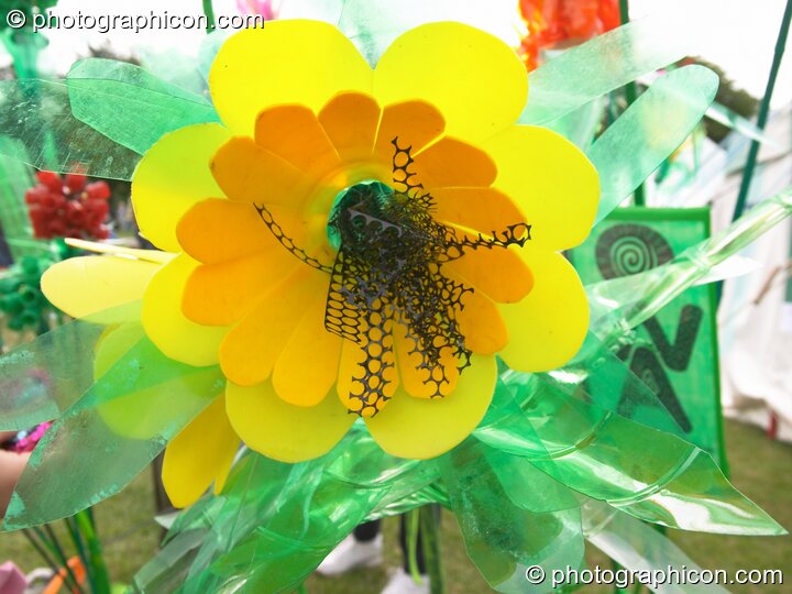 A flower made from reclaimed scrap plastic at the London Green Lifestyle Show 2005. London, United Kingdom. © 2005 Photographicon