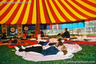 Peaceful meditation in the Healing Area at Kingston Green Fair 2003. Kingston upon Thames, United Kingdom. © 2003 Photographicon