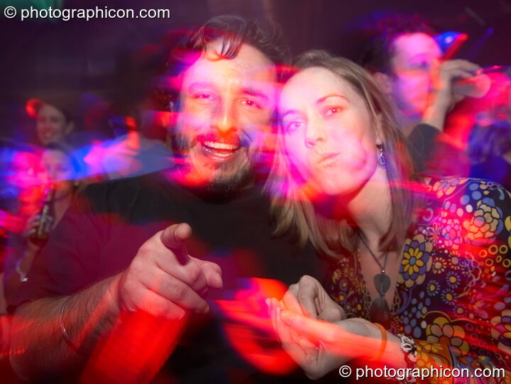 Jason & Georgie have a sketchy moment at Echo System. London, United Kingdom. © 2006 Photographicon