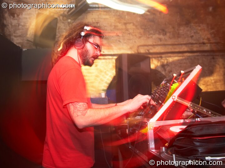 Justin Chaos DJing in the Dub Club space at Echo System. London, United Kingdom. © 2006 Photographicon