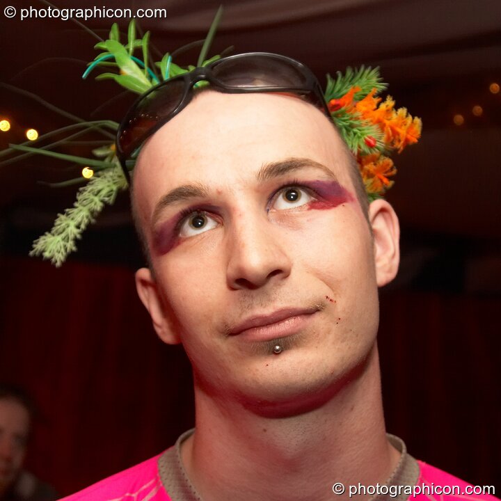 Man wearing a crown of flowers at Chrysalid. London, United Kingdom. © 2006 Photographicon