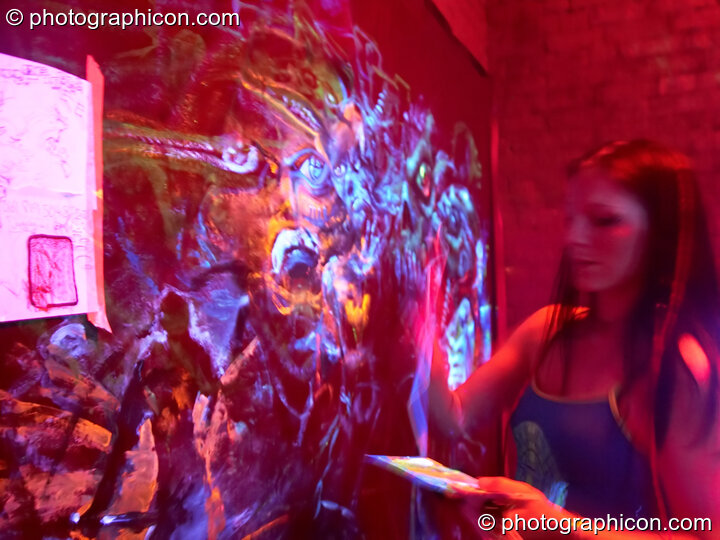 Dynamic backdrop artwork being painted by UV Lab (and passing guests) live in the anti-room at Chrysalid. London, United Kingdom. © 2006 Photographicon