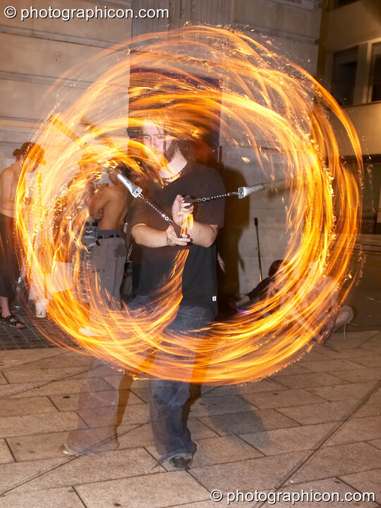 Fire performance by Alex Lee of Jedi Jugglers outside the Kalahari party. London, United Kingdom. © 2006 Photographicon