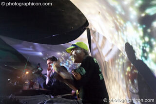 Simon Posford and Raja Ram of Shpongle DJing on the IDSpiral stage at the Twisted Records 10th Birthday Party. London, United Kingdom. © 2006 Photographicon