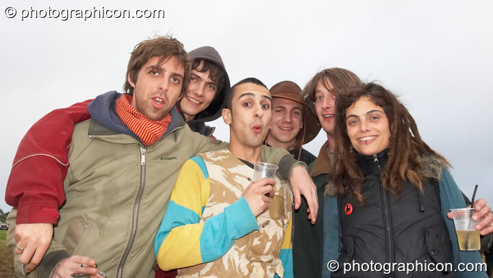 Friends organisers and Brixtonians drink to the rain at the Echo Festival. Overton, United Kingdom. © 2007 Photographicon