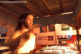 Dreadnaut (Alex Lee) DJ's in the chillout at Saharawi, The Synergy Centre. London, United Kingdom. © 2007 Photographicon