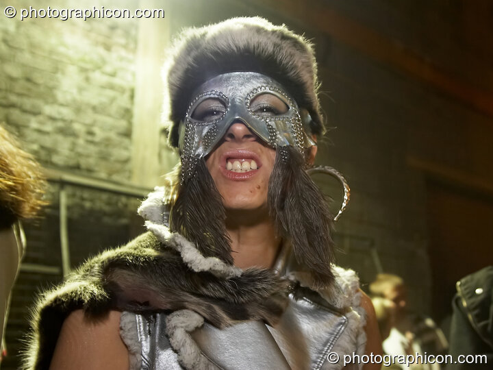 A woman in masqued costume outside the Pukka / Interpole / Mindscapes Halloween party. London, United Kingdom. © 2007 Photographicon