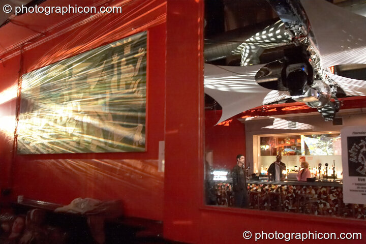 Decor and projections by Pixel Addicts reflected in a large wall-hung mirror in the Main Room at Future Music Vol. 1. London, United Kingdom. © 2007 Photographicon