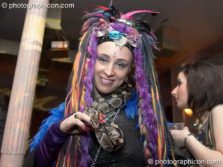 Kwalilox dances with her snake, Khan, at Future Music Vol. 1. London, United Kingdom. © 2007 Photographicon