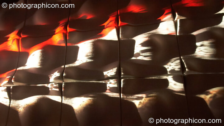 Oil wheel projections on shaped tiles at Dave Green's birthday party. London, United Kingdom. © 2007 Photographicon