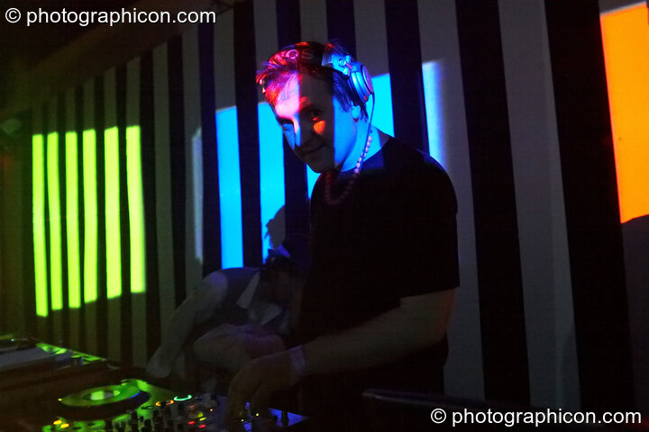Dave Green DJ's in front of a video installation by Pixel Addicts featuring bar screen and VJ projections at Dave Green's birthday party. London, United Kingdom. © 2007 Photographicon