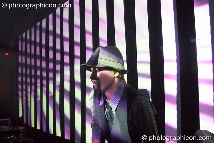 Louise Gandolfi (Chillosophy / IDSpiral, UK) DJ's in front of a video installation by Pixel Addicts featuring bar screen and VJ projections at Dave Green's birthday party. London, United Kingdom. © 2007 Photographicon