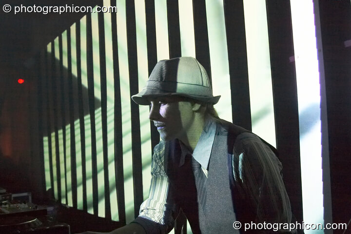 Louise Gandolfi (Chillosophy / IDSpiral, UK) DJ's in front of a video installation by Pixel Addicts featuring bar screen and VJ projections at Dave Green's birthday party. London, United Kingdom. © 2007 Photographicon