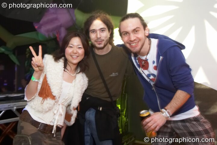 Kana, Tron, and Beatnik (all from Liquid Records) link arms on the Liquid Records & Tribe of Frog stage at Alpha Omega. London, United Kingdom. © 2008 Photographicon