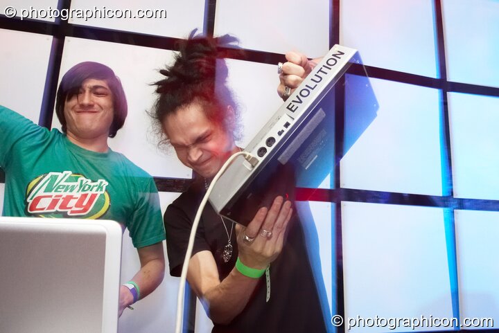 Mark Owens of Screenager (Shook) vs Cameron Leonard-Schroff of Nagual Sound Experiment (Liquid Records) perform on the Square Roots & Blood Tribe stage with visual installation by Inside-Us-All at Alpha Omega. London, United Kingdom. © 2008 Photographicon