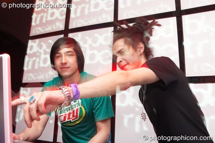 Mark Owens of Screenager (Shook) vs Cameron Leonard-Schroff of Nagual Sound Experiment (Liquid Records) perform on the Square Roots & Blood Tribe stage with visual installation by Inside-Us-All at Alpha Omega. London, United Kingdom. © 2008 Photographicon