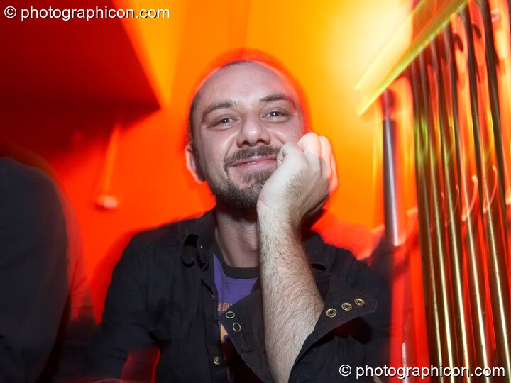 A man sits on stairs in the Folktronica Room at Future Music. London, United Kingdom. © 2008 Photographicon