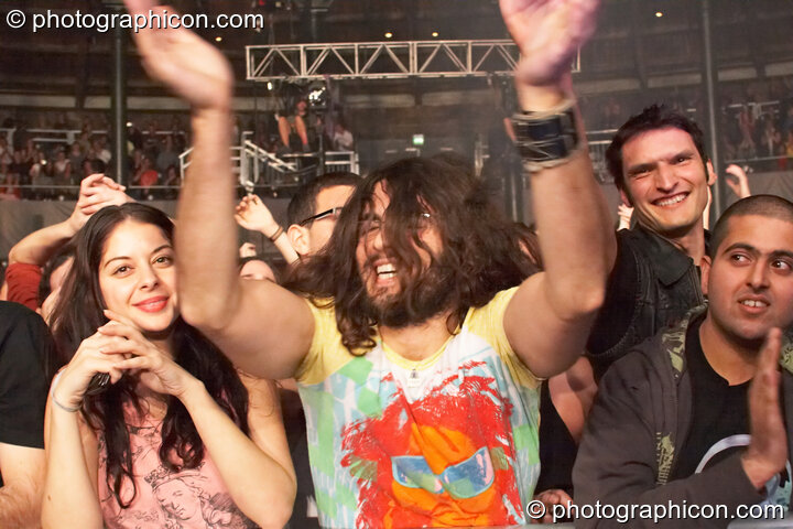 The audience cheer and clap at Shpongle Live in Concert. London, United Kingdom. © 2008 Photographicon