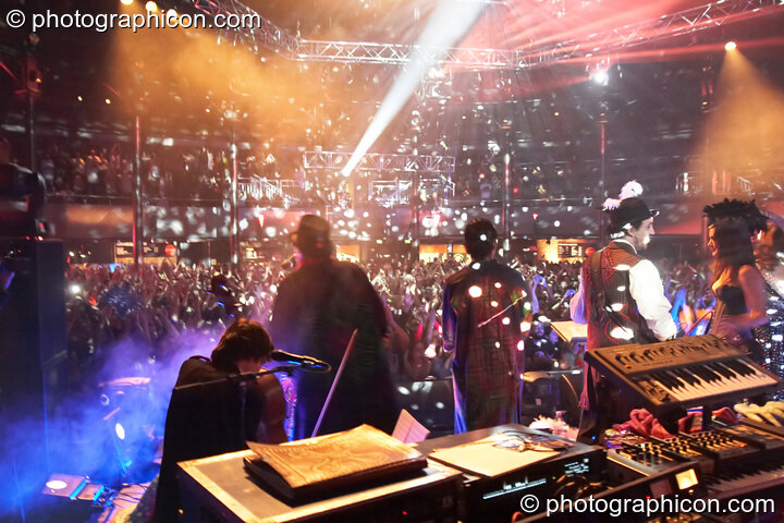 The audience, band, and light show viewed from the back of the stage at Shpongle Live in Concert. London, United Kingdom. © 2008 Photographicon