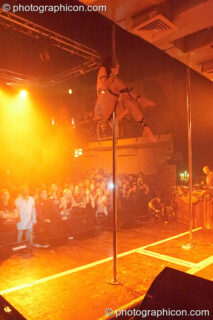 Terri Hosford of Fluorotrash performs psychedelic pole dancing on the Skandalous! stage at Electric Circus / Circus2Gaza. London, United Kingdom. © 2009 Photographicon