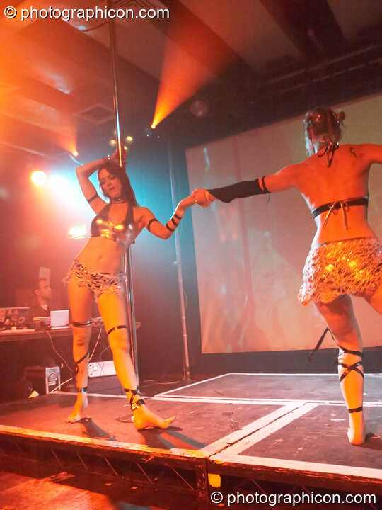 Terri Hosford and Ingrid of Fluorotrash perform psychedelic pole dancing on the Skandalous! stage at Electric Circus / Circus2Gaza. London, United Kingdom. © 2009 Photographicon