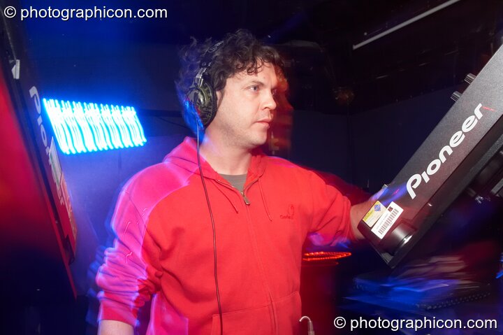 Liquid Ross (Liquid Records) DJs in the Psytrance room at the Haiti Appeal Party 09/04/2010. London, United Kingdom. © 2010 Photographicon