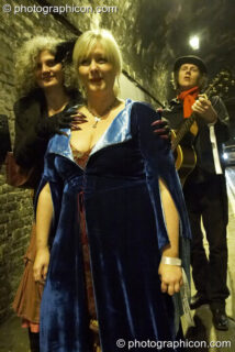Michelle Watson and a sister Goose Girl are serenaded by Nigel of Bermondsey in the Weston Street tunnel at The Halloween of the Cross Bones XIII. London, United Kingdom. © 2010 Photographicon