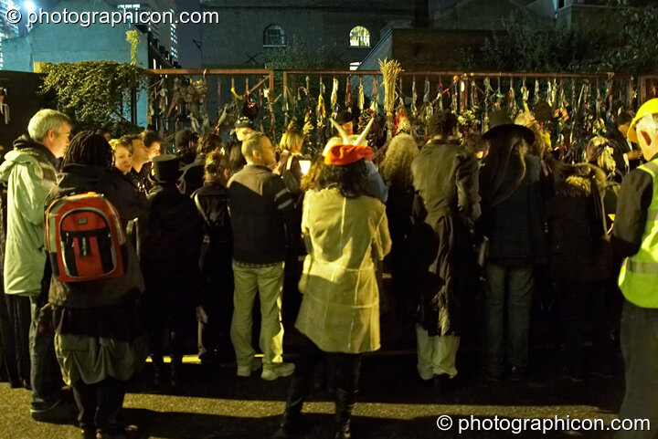 Participants honour The Goose and her outcast dead outside the gates of the old Cross Bones graveyard at The Halloween of the Cross Bones XIII. London, United Kingdom. © 2010 Photographicon