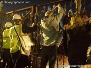 Participants honour The Goose and her outcast dead outside the gates of the old Cross Bones graveyard at The Halloween of the Cross Bones XIII. London, United Kingdom. © 2010 Photographicon