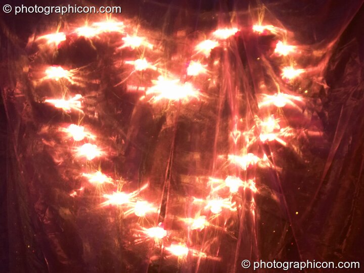 An illuminated heart, part of the White Tara Healing Temple at the Synergy Project. London, United Kingdom. © 2004 Photographicon