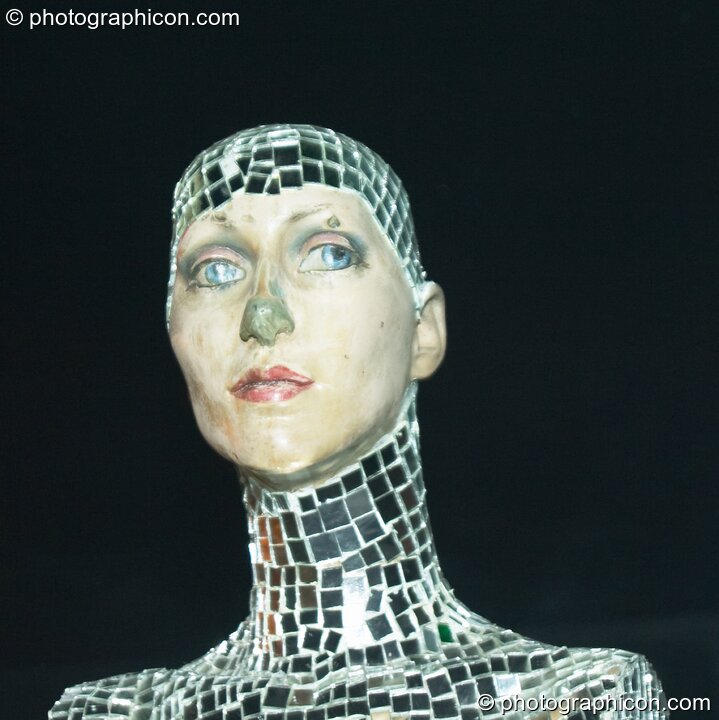 Manequin head covered in small mirror tiles in the Project Ozma space at the Synergy Project. London, United Kingdom. © 2004 Photographicon