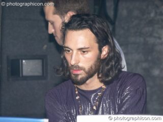 Ralf absorbed in his VJing visual wizardry in the Project Ozma space at the Synergy Project. London, United Kingdom. © 2004 Photographicon