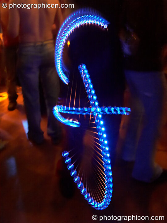 Jedi juggling with illuminated poi at The Synergy Project. London, United Kingdom. © 2006 Photographicon