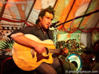Symeon Webb in the	Family Gathering yurt at The Synergy Project. London, United Kingdom. © 2006 Photographicon