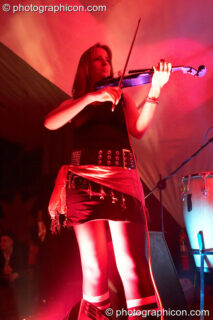 Kate Farbon of Orchid Star on the Small World Stage at The Synergy Project. London, United Kingdom. © 2006 Photographicon