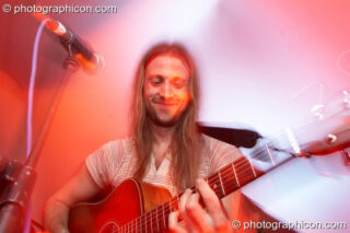 Luke Parker of Martha Tilston and The Woods on the Small World Stage at The Synergy Project. London, United Kingdom. © 2006 Photographicon