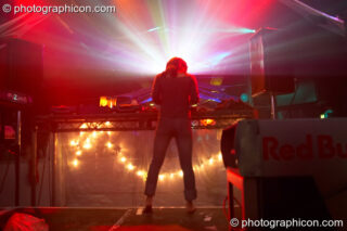 Kana radiates light while DJing in the Liquid Records / Inside-Us-All space at The Synergy Project. London, United Kingdom. © 2006 Photographicon